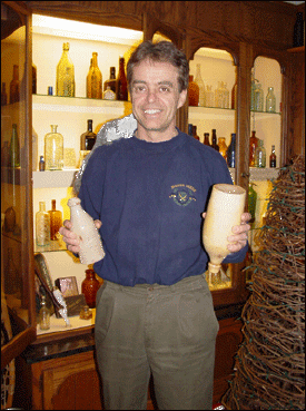Peter Maas with his varied and intense Wisconsin Antique bottle collection